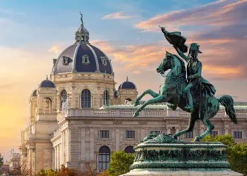 Statue of Archduke Charles on Heldenplatz square and Museum of Natural History dome, Vienna, Austria