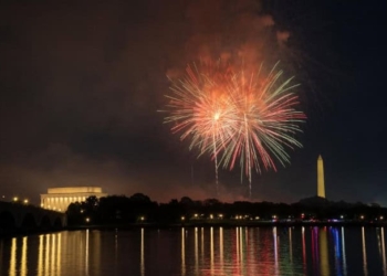 Fireworks illuminate the skyline above the Lincoln Memorial, Washington Monument, and U.S. Capitol during U.S. Independence Day celebrations, as seen from Arlington, VA, on July 4, 2025. (Photo by Mohammad Reza Mousavi / Middle East Images via AFP)