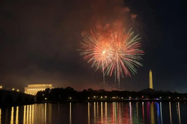 Fireworks illuminate the skyline above the Lincoln Memorial, Washington Monument, and U.S. Capitol during U.S. Independence Day celebrations, as seen from Arlington, VA, on July 4, 2025. (Photo by Mohammad Reza Mousavi / Middle East Images via AFP)
